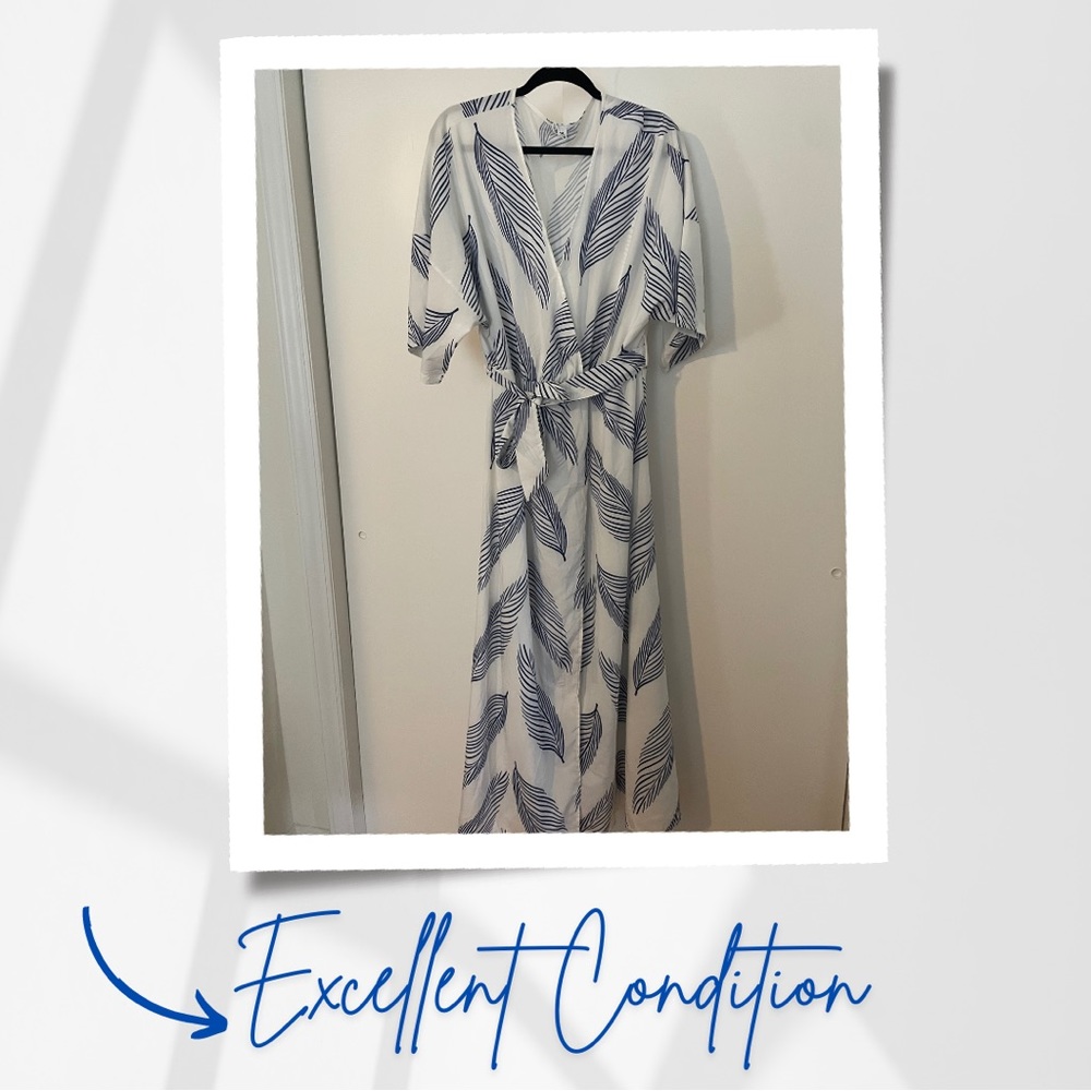 White Dress with Blue Feathers